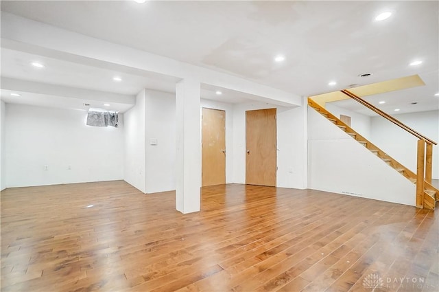 basement with wood-type flooring