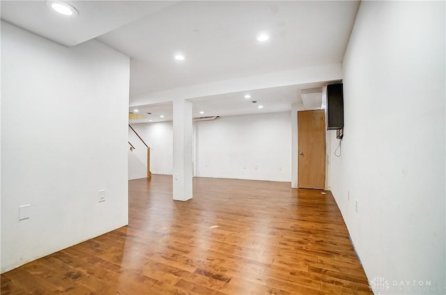 basement featuring wood-type flooring