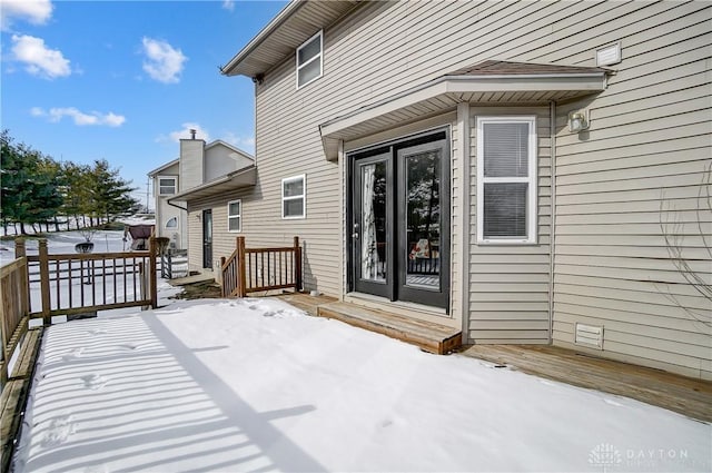 view of snow covered deck