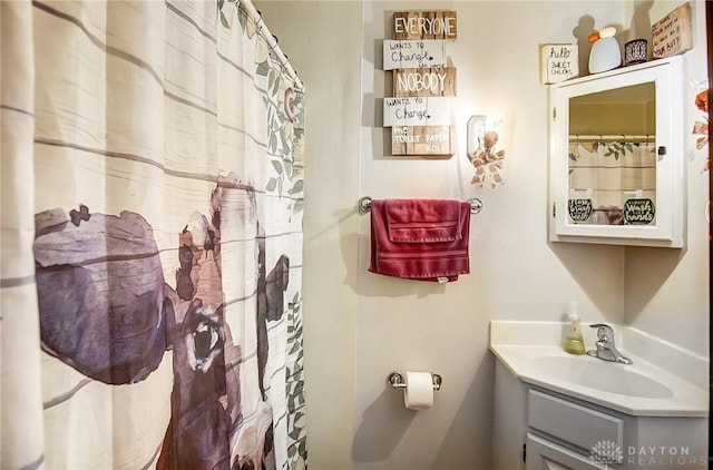 full bathroom with vanity