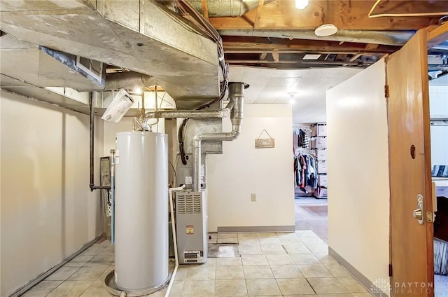 utility room featuring gas water heater