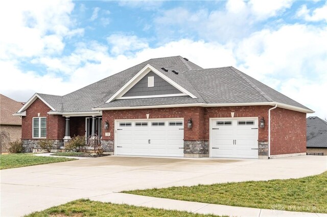 craftsman inspired home featuring a garage