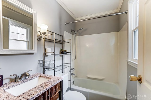 bathroom with crown molding, shower / bathing tub combination, toilet, and vanity