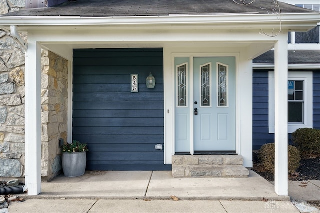 545 E Whipp Rd, Dayton, OH 45459 - entrance to property with a shingled roof and stone siding