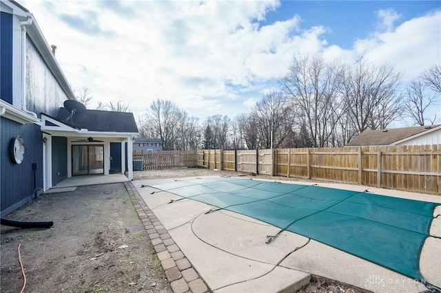 view of swimming pool with a fenced in pool, a patio area, and a fenced backyard