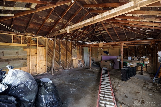 misc room featuring lofted ceiling