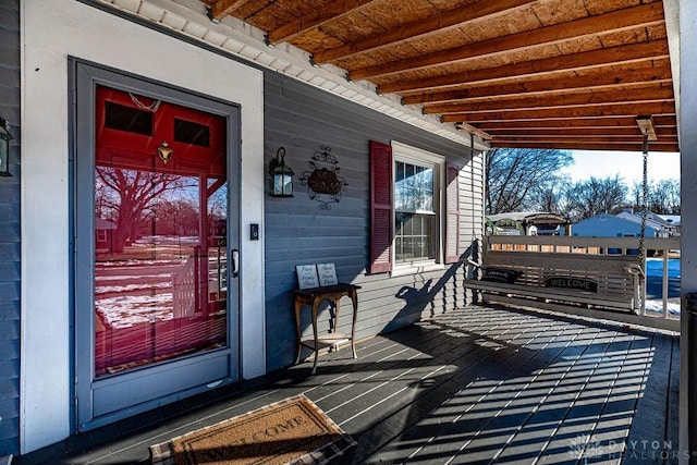 entrance to property with a porch