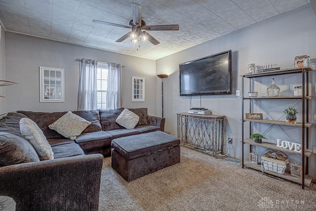 carpeted living room with ceiling fan