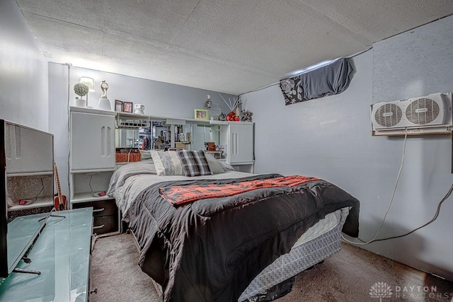 carpeted bedroom with a textured ceiling