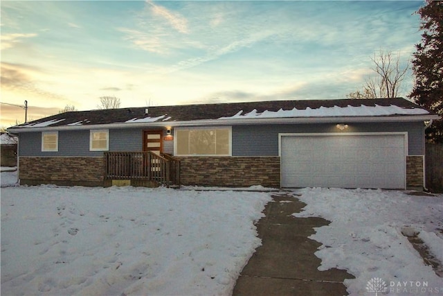 single story home with a garage