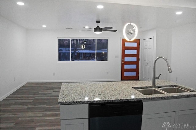 kitchen with sink, gray cabinets, light stone countertops, and black dishwasher