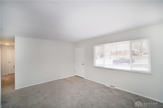 empty room with carpet floors