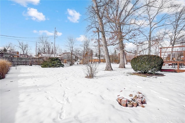 view of yard covered in snow