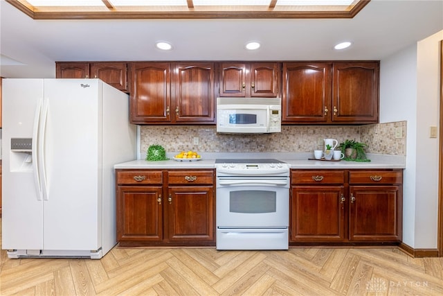 kitchen featuring tasteful backsplash, white appliances, and light parquet flooring