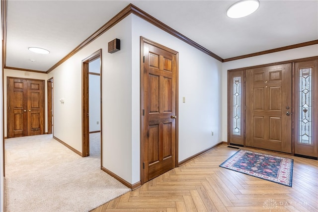 entryway featuring light parquet floors and crown molding