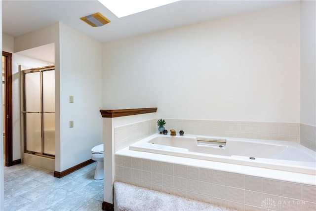 bathroom featuring shower with separate bathtub and toilet