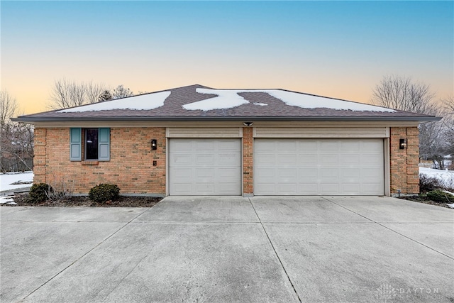 ranch-style home with a garage