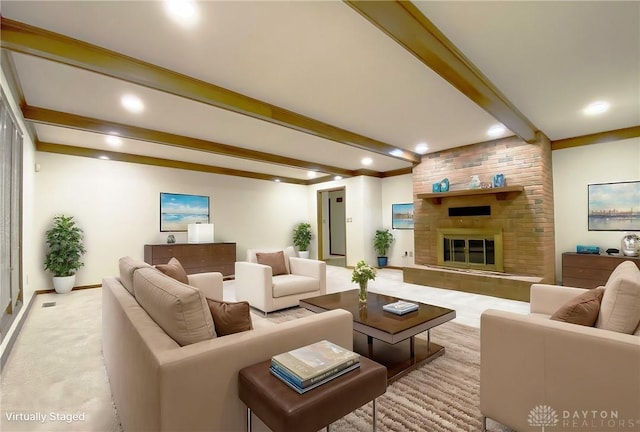 living room with light colored carpet, a large fireplace, and beamed ceiling