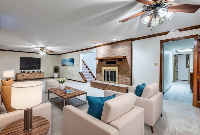 living room featuring light carpet, a brick fireplace, ornamental molding, and ceiling fan