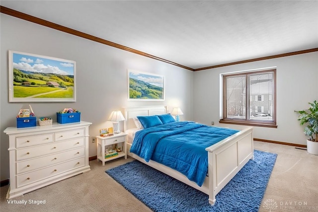 bedroom featuring crown molding and light carpet