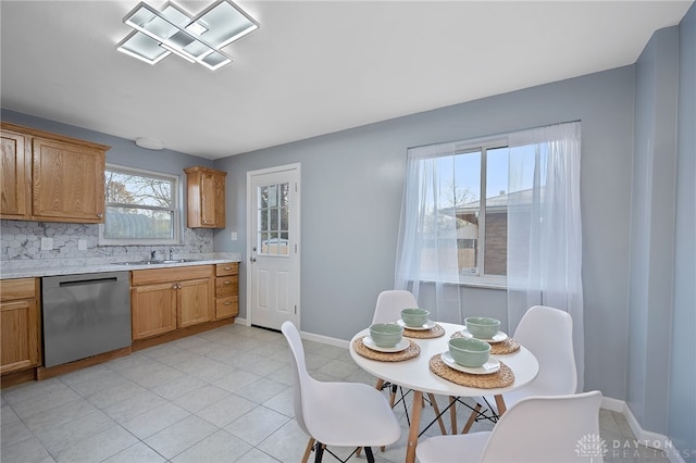 dining room featuring sink