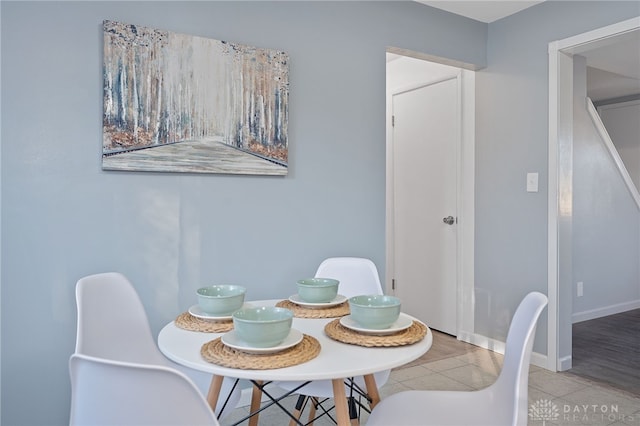 dining room featuring light tile patterned floors