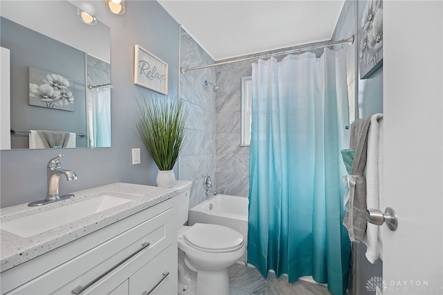 full bathroom featuring toilet, vanity, and shower / bathtub combination with curtain