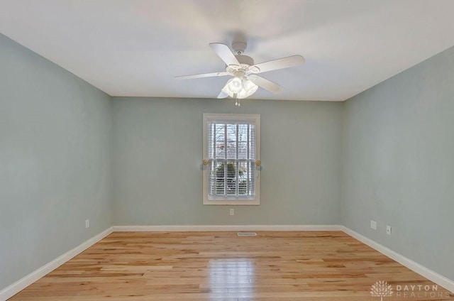 unfurnished room featuring ceiling fan and light hardwood / wood-style floors