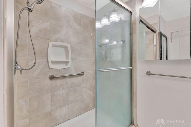 bathroom with an enclosed shower