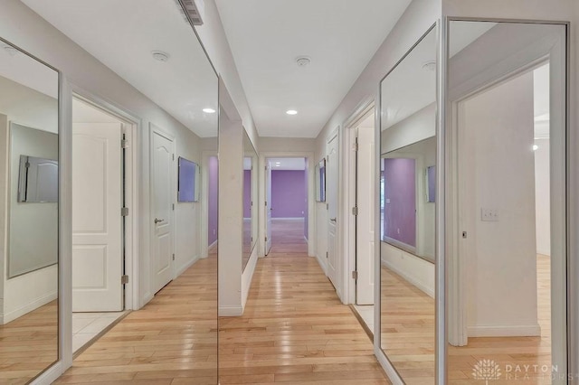 hall featuring light hardwood / wood-style flooring