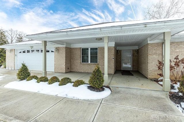 doorway to property featuring a garage