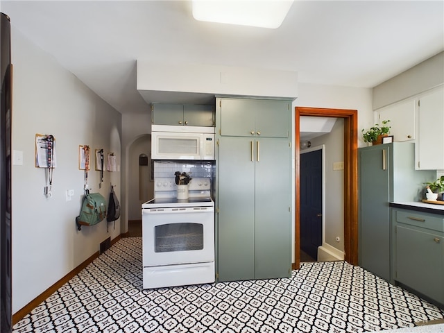 kitchen featuring white appliances and decorative backsplash