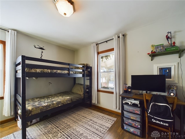 bedroom featuring dark wood-type flooring