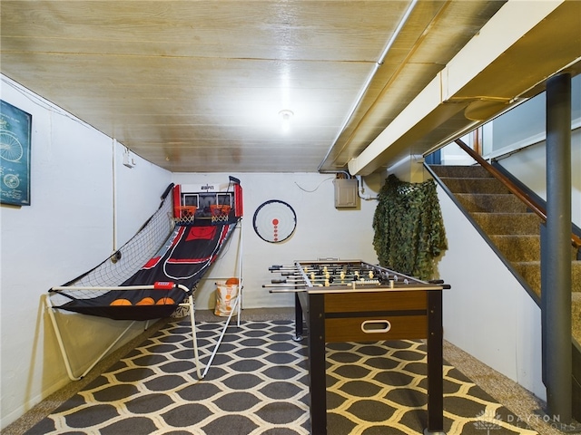 game room with wooden ceiling