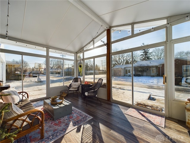 sunroom / solarium with lofted ceiling