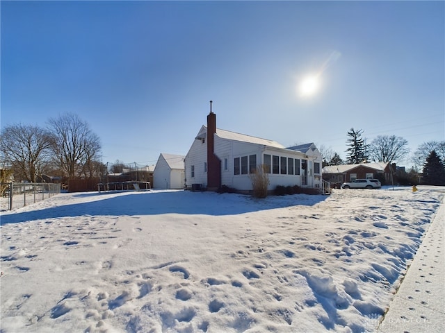 view of snow covered house