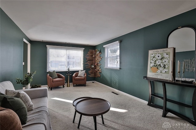 living room featuring light colored carpet