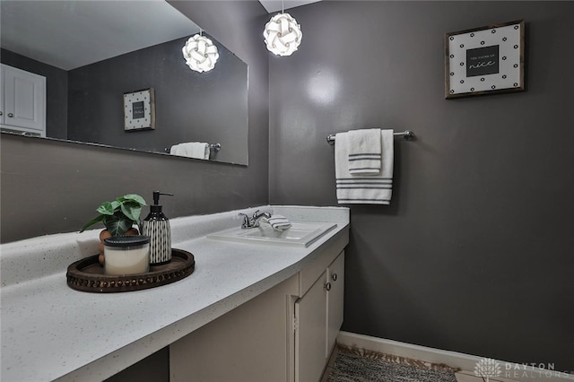 bathroom with tile patterned flooring and vanity