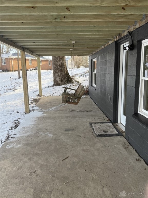 view of snow covered patio