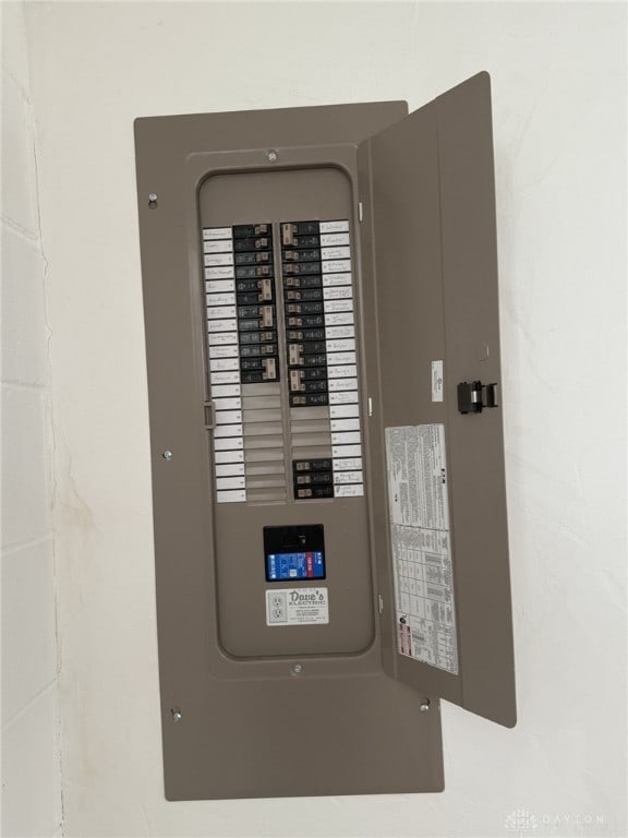 utility room featuring electric panel