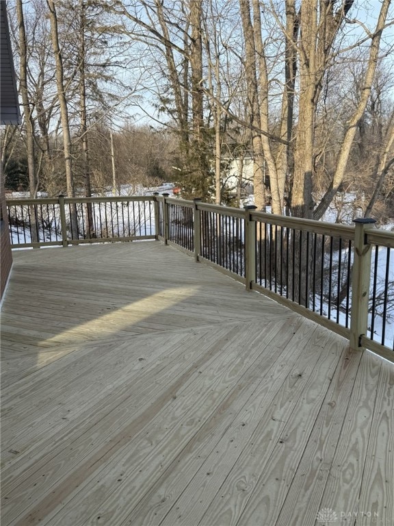 view of snow covered deck