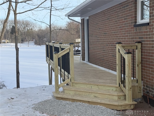 view of snow covered deck