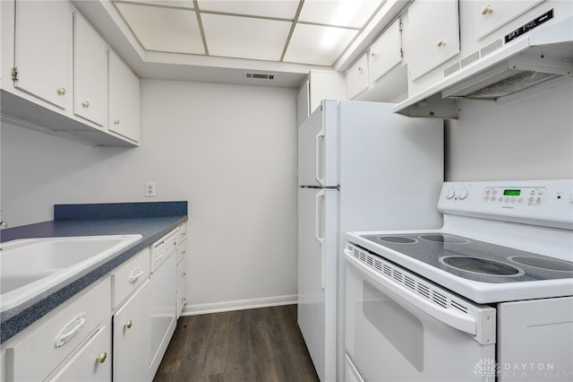 kitchen with dark hardwood / wood-style floors, sink, white cabinets, and white appliances