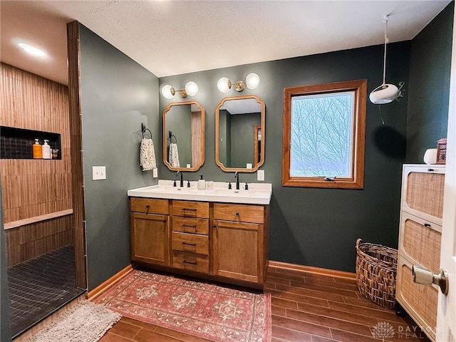 bathroom with vanity and walk in shower