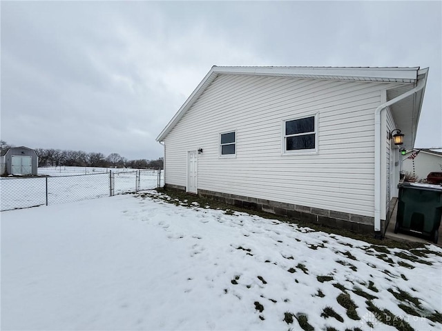 view of snow covered property