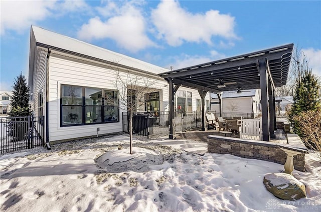 snow covered patio with ceiling fan