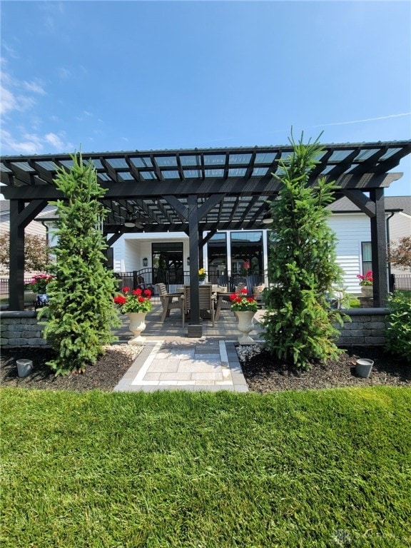 view of yard with a pergola and a patio area