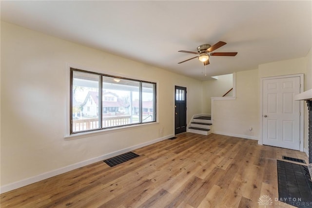 interior space featuring ceiling fan and light hardwood / wood-style floors