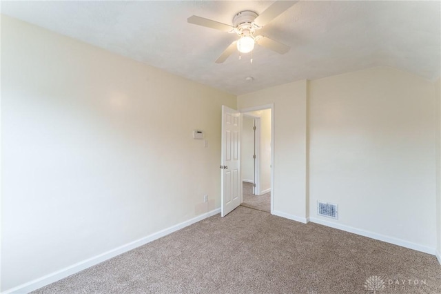 unfurnished bedroom featuring light colored carpet and ceiling fan