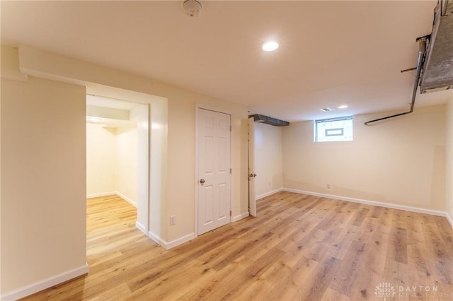 basement featuring light wood-type flooring